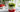 Iced Matcha Latte mit Erdbeeren im Glas