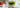 Iced Matcha Latte mit Erdbeeren im Glas